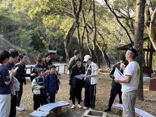 A group of people standing outside
AI-generated content may be incorrect.